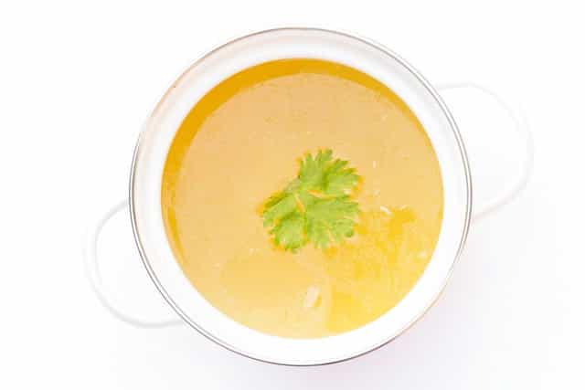 Cooking in broth macro photo