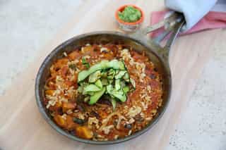 Photo of Roasted tomato risotto with grilled zucchini & rocket pesto